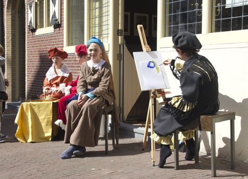 Children enacting the painting of the Girll with the Pearl Earring in Delft