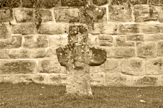 penitence cross and an old wall