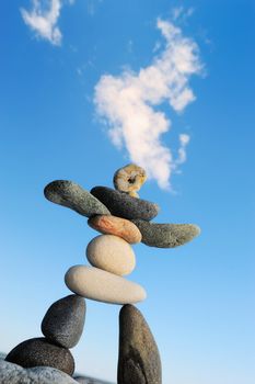 Artistic balance of stones performed as figurine