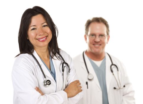 Friendly Hispanic Female Doctor and Male Colleague Behind Isolated on a White Background.