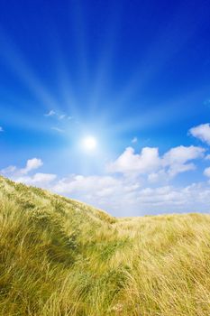 Idyllic dunes with sunlight