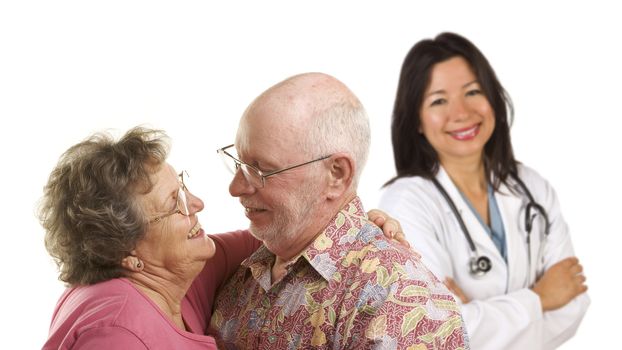 Happy Loving Senior Couple with Smiling Hispanic Medical Doctor or Nurse Behind Isolated on a White Background.