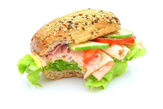 Fresh sandwich with ham and cheese and vegetables