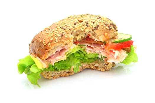 Fresh sandwich with ham and cheese and vegetables