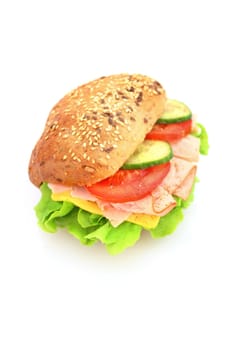 Fresh sandwich with ham and cheese and vegetables