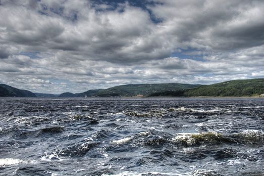 Rough water of Saint Lawrence River in a August afternoon
