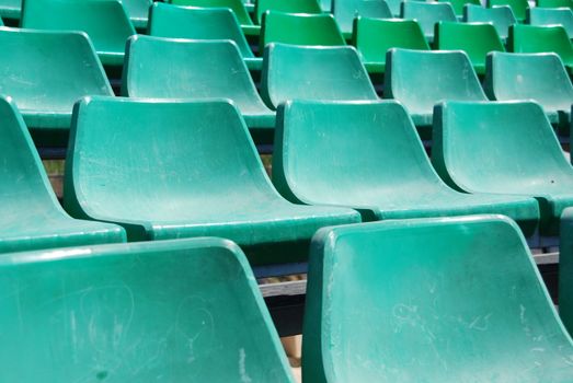 close up of green seats on a beach stadium