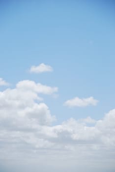 photo of enchanted clouds on light blue sky