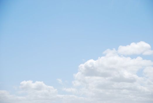 photo of enchanted clouds on light blue sky