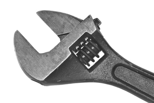 A closeup shot of an adjustable wrench on a white background