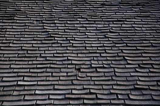 The texture of wooden roof shingles makes a nice background image.