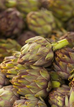 Pile of Artichokes Vertical at the farmers market