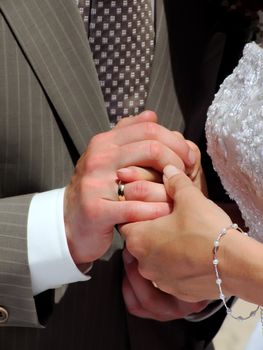 Bride and Groom's hands during a wedding ceremony