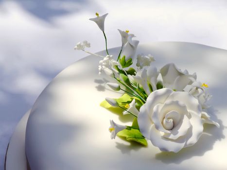 Detail of decoration on wedding cake made out of sweets