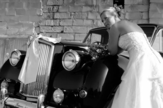 Bride near car