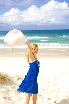 pretty young girl at the beach in summer