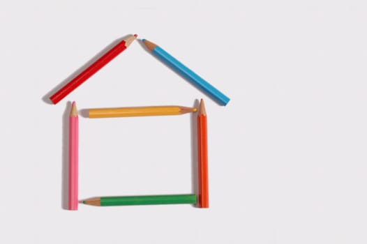 crayons make  plan of small  house