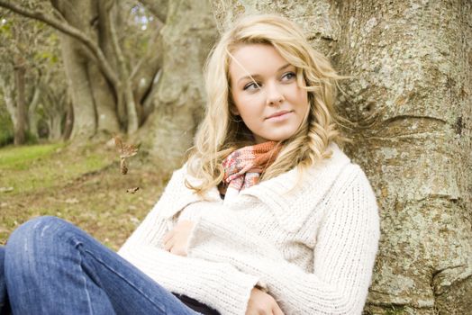 Beautiful girl smiling and relaxing in the park