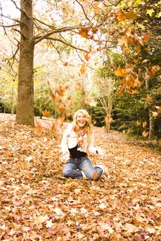 pretty girl in the park during autumn