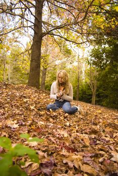 pretty girl in the park during autumn