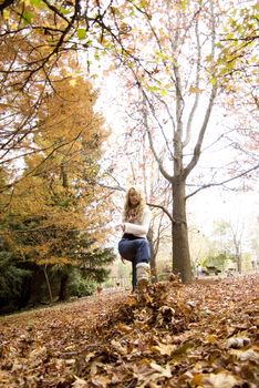 pretty girl in the park during autumn