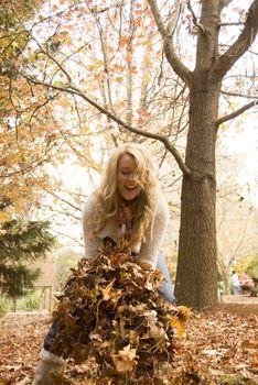 pretty girl in the park during autumn