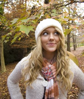 pretty girl in the park during autumn