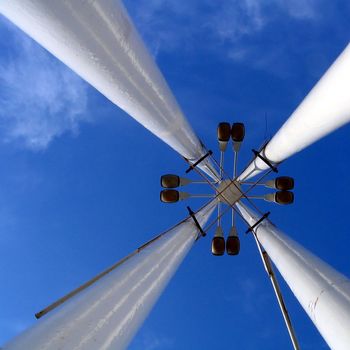 Big street lamp on blue sky background