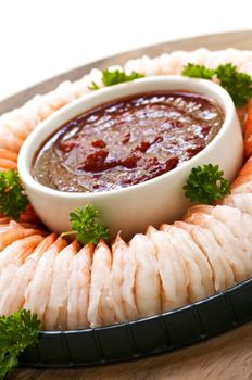 Shrimp ring appetizer platter with dipping sauce