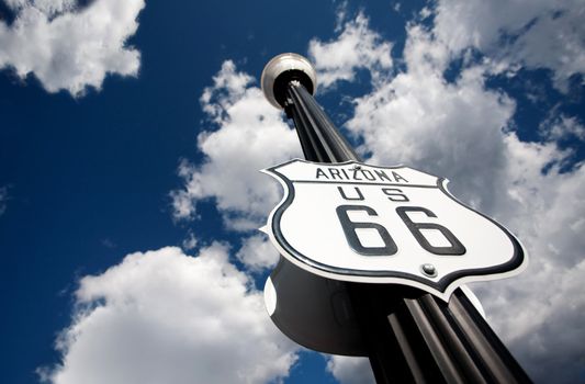 Route 66 sign on tall street lamp pole