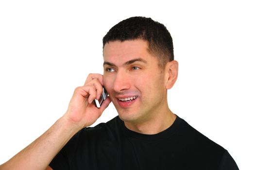 A portrait of a smiling Caucasian man talking on a mobile phone isolated over white background.