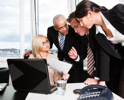 Business team at the meeting discussing work