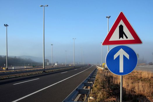 signs in foggy motorway in Croatia