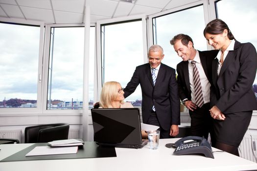 Business team at the meeting discussing work