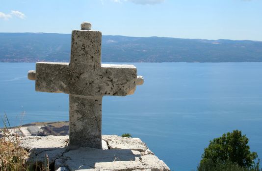 lonely cross over the sea