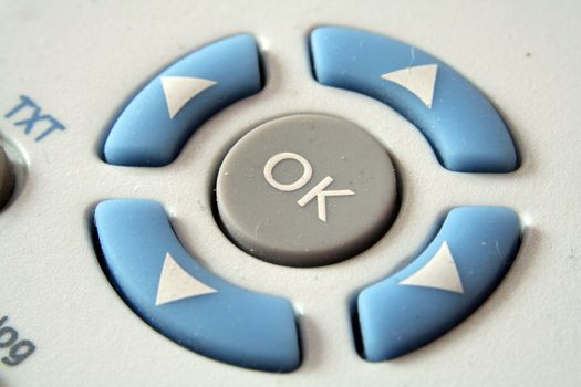 fragment of remote controller with OK button