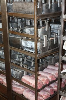 Ham in production proces in a cold cut factory