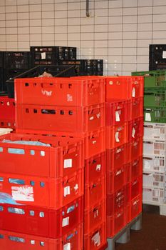 Huge stack of red storage crates, factory stock