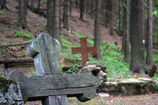 wooden cross on old german cemetery in Gluszyca (Poland)