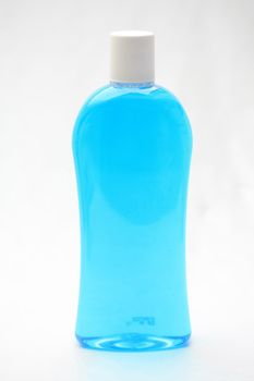 Isolated blue shampoo bottle