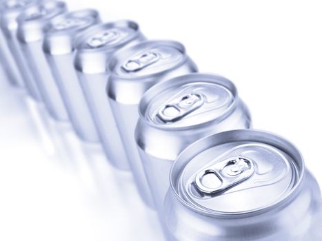 Close up view of a row of tin cans. Shallow depth of field.