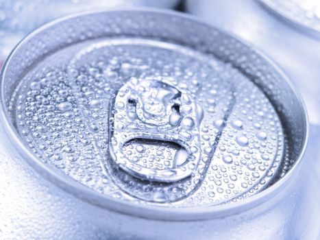 Close up view of a tin can with condensation.