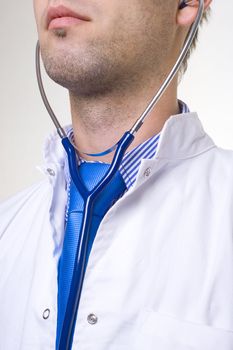portrait of a doctor with blue stethoscope 