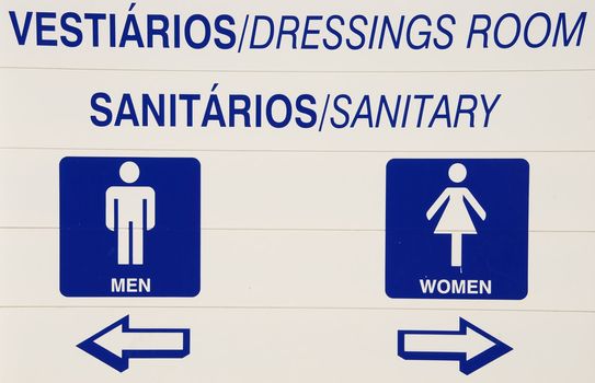 blue and white sanitary and dressing room sign at the pool