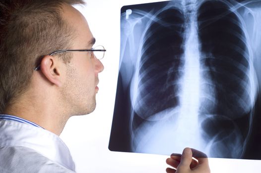 male doctor holding x-ray image on white background