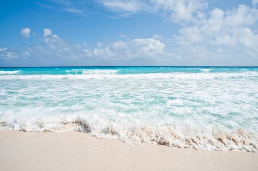 Gentle waves at a tropical beach