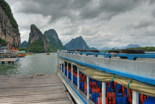 A colourful Boat anchored at a Fishermen Community near Krabi, Thailand