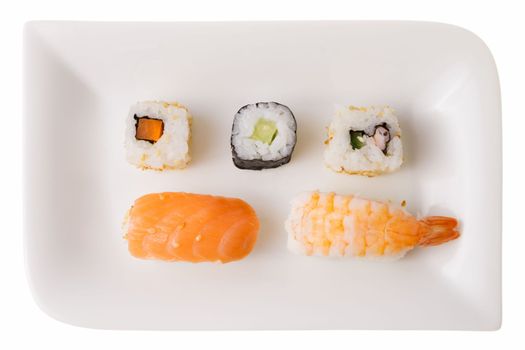 Sushi rolls. California roll carrot, Makizushi cucumber, California roll, Nigiri Sushi salmon, Nigiri Sushi king prawn. Isolated on white