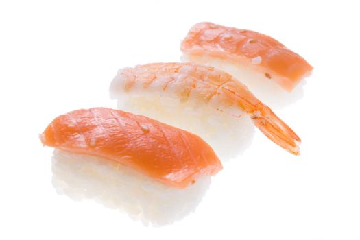 Two Nigiri Sushi salmon and Nigiri Sushi king prawn. Isolated on white