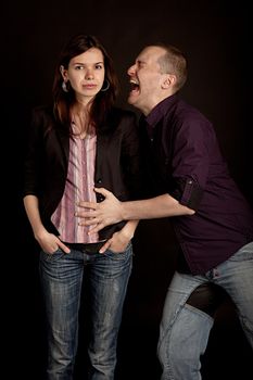 Young men screaming to woman. Studio shot